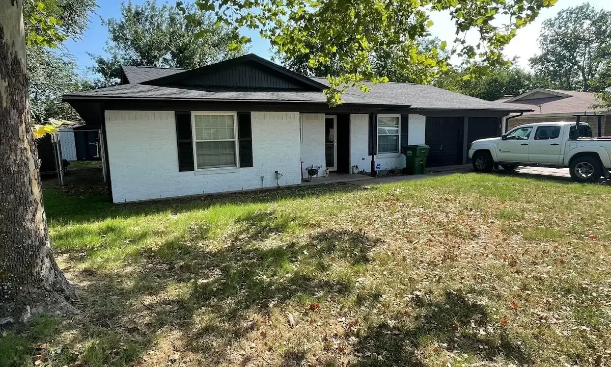 Professional roofing crew working on a residential roof in North Salem